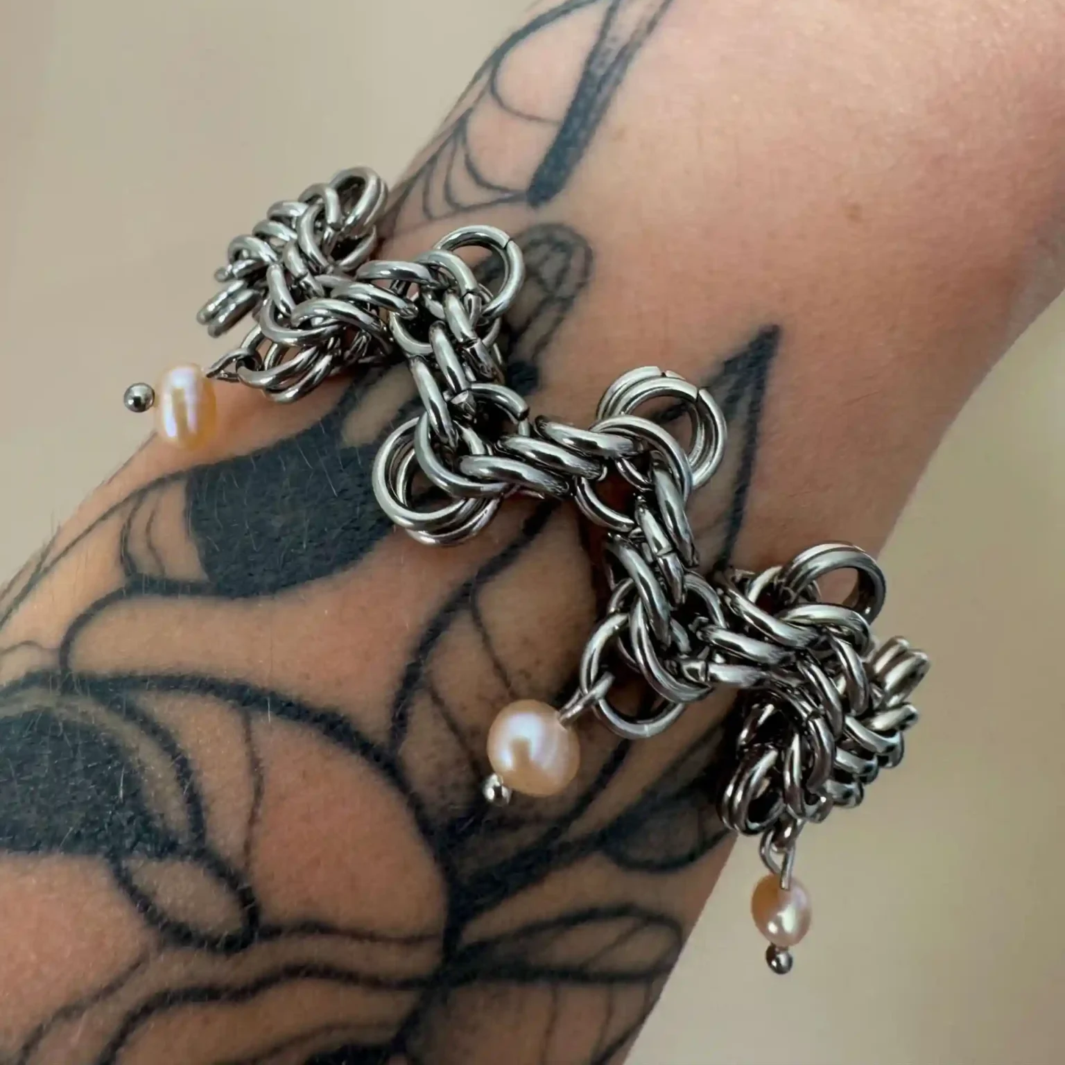 Lana pearl chainmail bracelet worn on wrist handmade jewelry