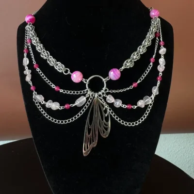 Handmade butterfly chainmail necklace with pink gemstones and layered chain details