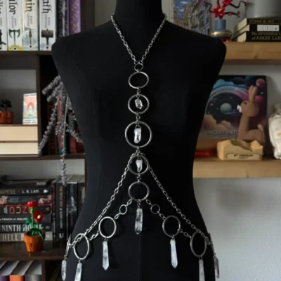 Handmade custom chainmail body chain featuring natural crystal pendants