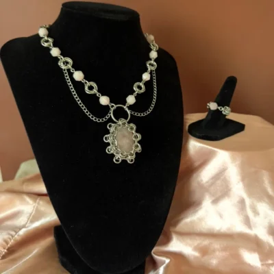 Handmade custom chainmail necklace and matching ring set featuring rose quartz gemstones