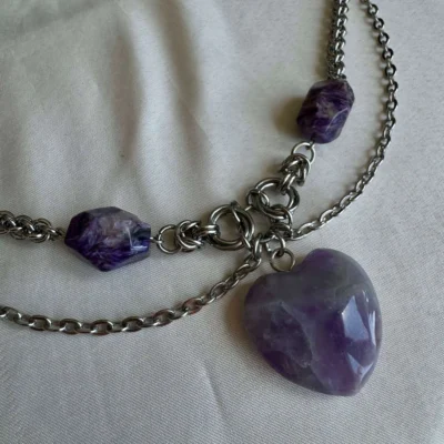Amarah purple gemstone chainmail necklace detail with faceted stones and heart pendant