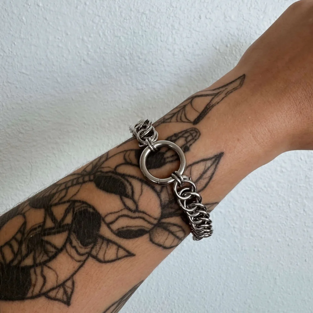 Blair stainless steel chainmail bracelet with statement ring centerpiece