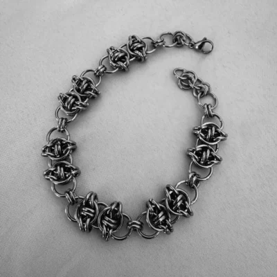 Inez Woven Chainmail Bracelet Inez woven chainmail bracelet with detailed stainless steel ring pattern
