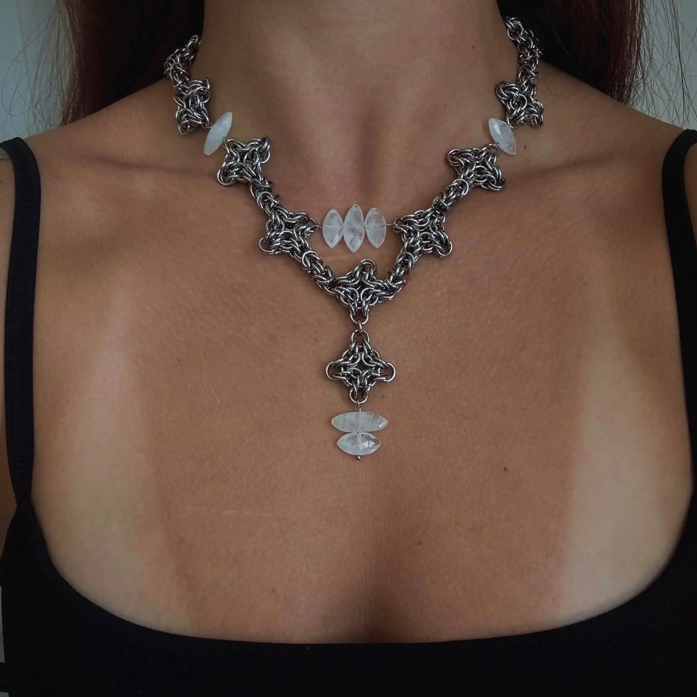 Seraphine white gemstone chainmail necklace worn with translucent stones and hanging centerpiece
